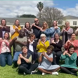 Staff from Makaton South Africa signing Happy Christmas